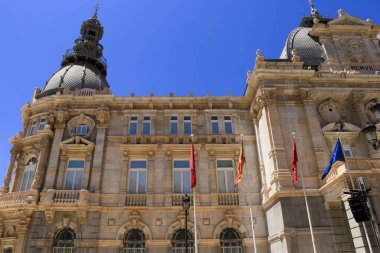Cartagena, Murcia, Spain- July 17, 2022: Beautiful and colossal town hall of Cartagena city on a sunny day of summer
