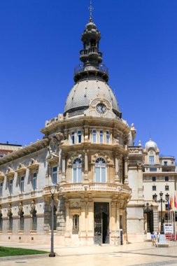 Cartagena, Murcia, Spain- July 17, 2022: Beautiful and colossal town hall of Cartagena city on a sunny day of summer
