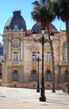 Cartagena, Murcia, Spain- July 17, 2022: Beautiful and colossal town hall of Cartagena city on a sunny day of summer