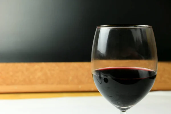 Glass of red wine on the table of a restaurant