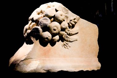 Alicante, Spain- July 20, 2022: Transenna with Cornupia. Fragment of the Colosseum exhibited at the Archaeological Museum of Alicante