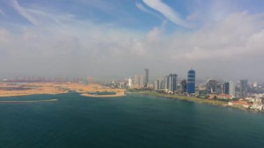 Colombo city with modern buildings and sea port. Sri Lanka.