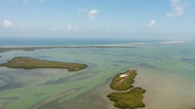 Aerial view of Dutch bay with islands on a background of blue sky and clouds. Seascape in Sri Lanka.