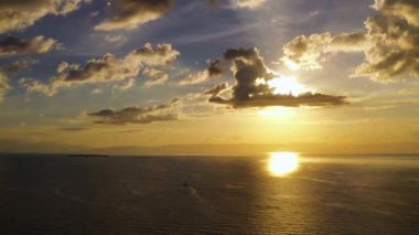Dramatic sunset over the Islands and the sea. Philippines.