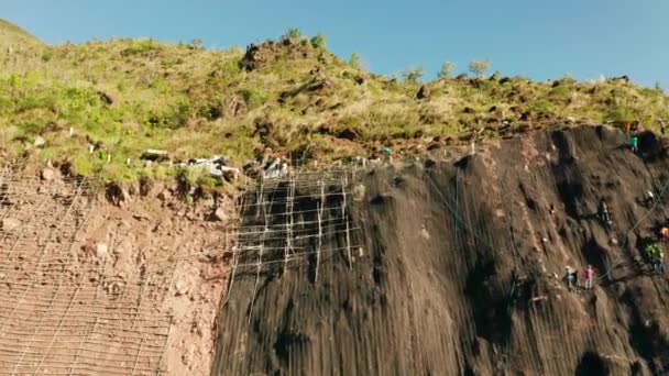 Workers Strengthen Slope Mountain Metal Mesh Preventing Rockfall Landslide Road — Stock Video