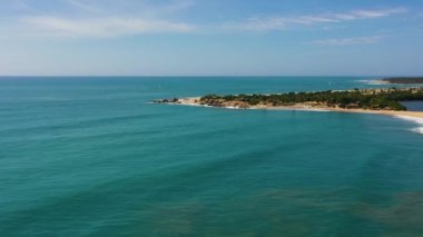 Beautiful sandy beach and sea surf with waves. Whiskey point, Sri Lanka.