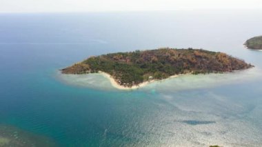 Aerial view of Seascape with beautiful beach and tropical islands. Bobo Island, Baong Island. Mindanao, Philippines.