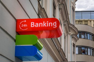 Villach, Austria - August 6, 2022: Austrian ATM sign on the facade of a building