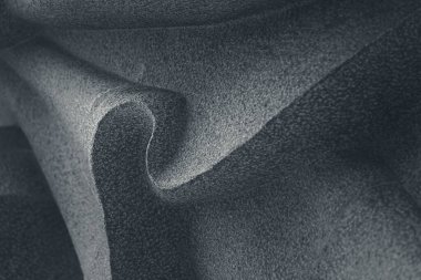 Soyut çizgiler ve granit taşın eğri heykeli. Arka plan için tek renkli doğu tarzı..