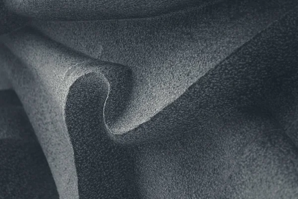 Soyut çizgiler ve granit taşın eğri heykeli. Arka plan için tek renkli doğu tarzı..