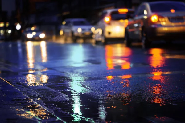 Night scene of city light after hard rain fall.