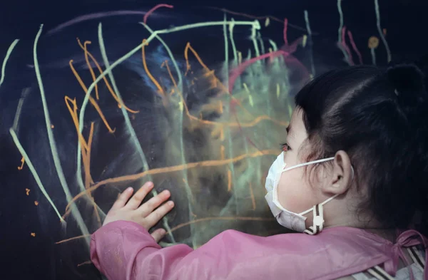 Little Asian Girl Wearing Face Mask Playing Chalk Blackboard Covid — kuvapankkivalokuva