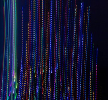 Colored light stripes background using intentional camera movement.
