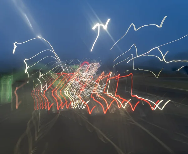 Zufällige Muster Von Lichtströmen Aus Fahrenden Fahrzeugen — Stockfoto