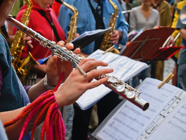 Street performers,playing music close up in Paris Street.