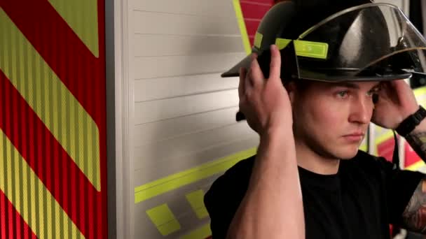Portrait Shot Caucasian Joyful Firefighter Taking Helmet Looking Confidently Camera — Vídeos de Stock