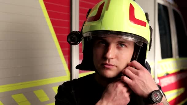 Portrait Shot Caucasian Joyful Firefighter Taking Helmet Looking Confidently Camera — Vídeo de Stock