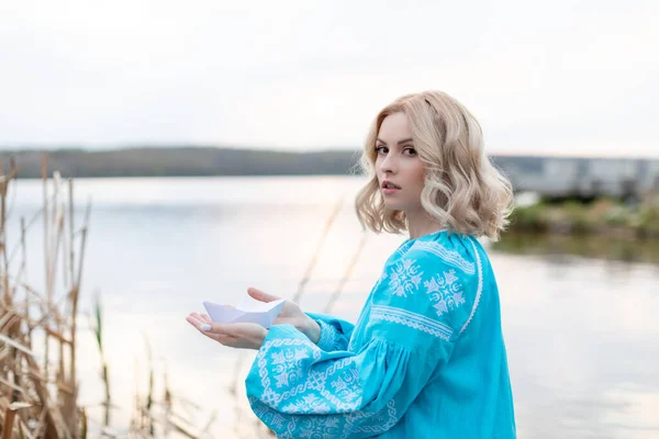 Young Beautiful Ukrainian Woman Blue Embroidered Shirt Holding Paper Boat — Fotografia de Stock