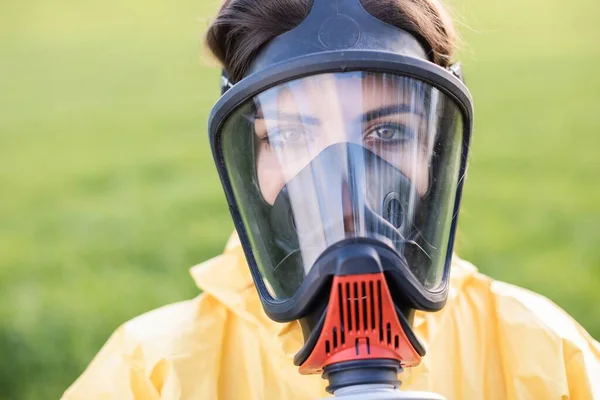 Person Overalls Gas Mask Call Planet While Standing Green Field — Stock Photo, Image