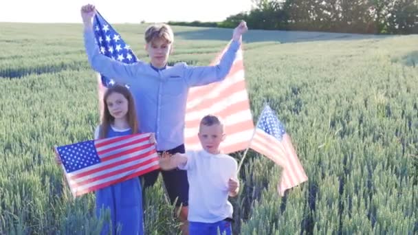 Three Children Different Ages Stand Wheat Field Hold American Flags — Stockvideo