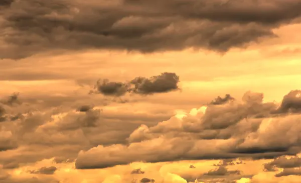 Swirling Clouds Illuminated Setting Sun — 图库照片