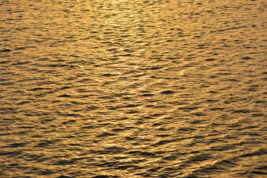 günbatımı zamanı yüzey su resmi