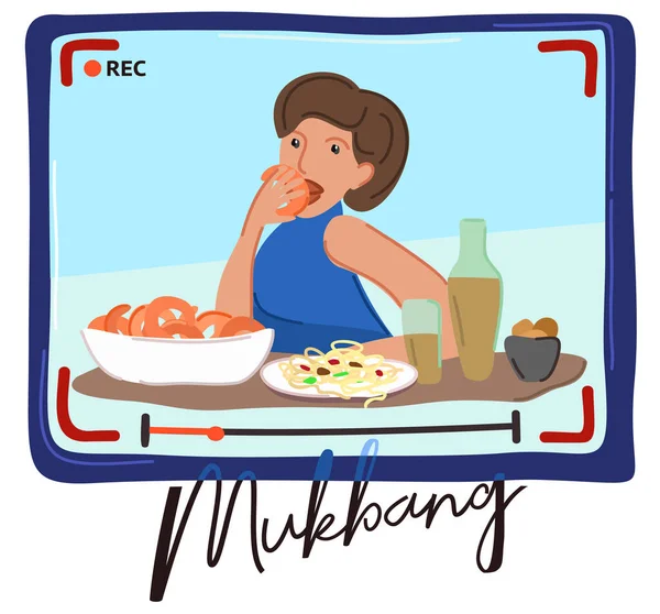 Blog yazarı kamerada yemek yiyor. Mukbang konsepti. Kadın karides ve makarna yer ve yediklerini kaydeder..