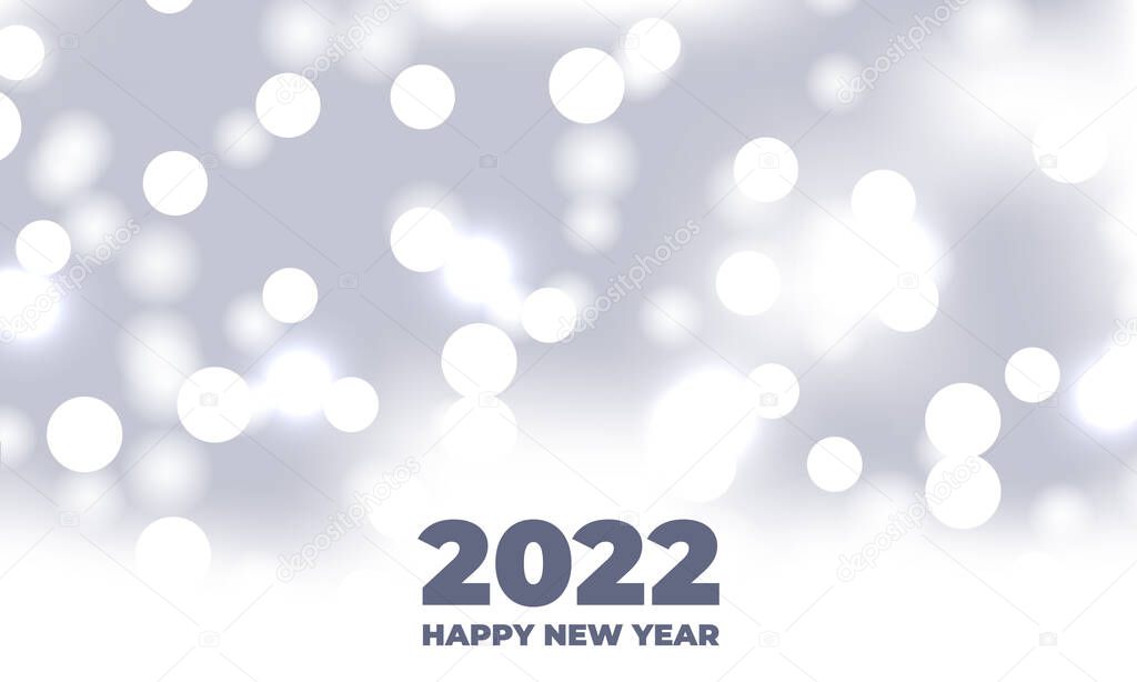 Happy new 2022 year white bokeh background festive defocused lights effect.