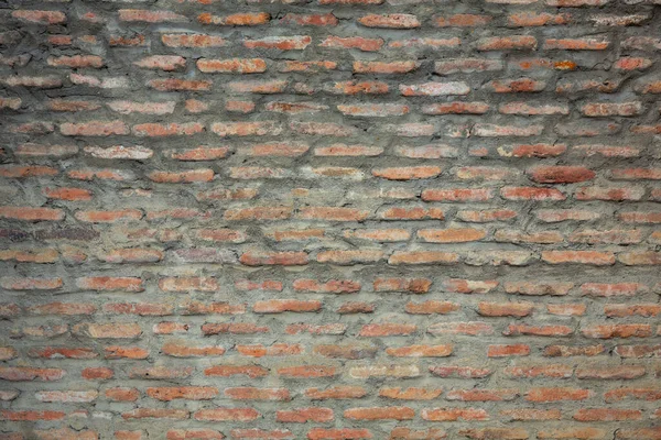 Eski, eski tuğla duvar dokusunun kırmızı arkaplanı. Ortaçağ duvarlı eski taş duvar manzarasını kapat, — Stok fotoğraf