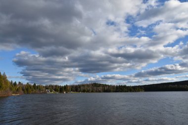 The lake under a cloudy sky in autumn, Sainte-Apolline, Quebec, Canada