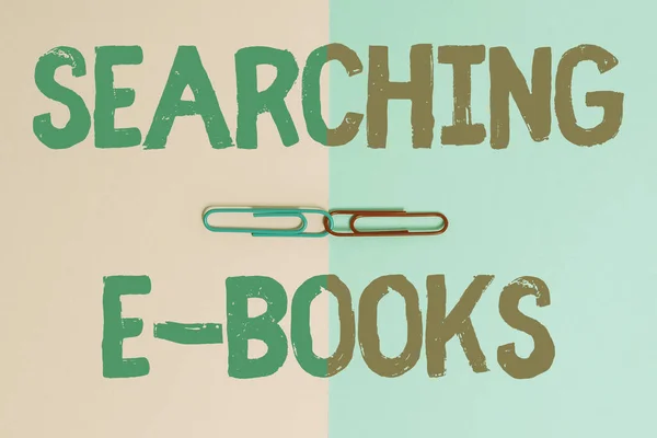 Text caption presenting Searching E Books. Concept meaning looking for an electronic form of educational material Two Objects Arranged Facing Inward Outward On a Separated Coloured Background — Stock Photo, Image