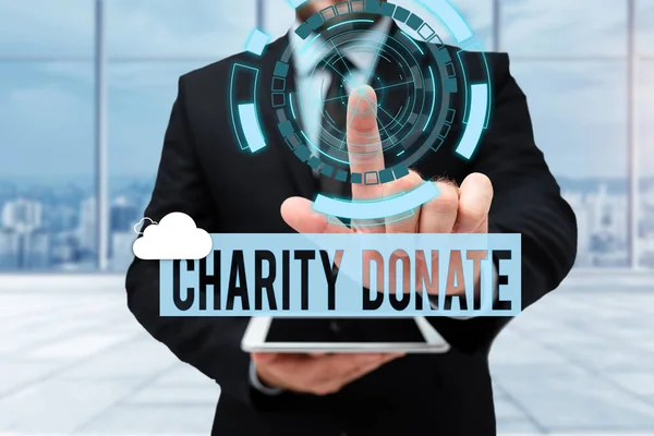 Handschrift Zeichen Charity Donate. Konzept bedeutet Geschenk eines Einzelnen an eine gemeinnützige Organisation Man In Uniform Standing Holding Tablet Typing Futuristic Technologies. — Stockfoto