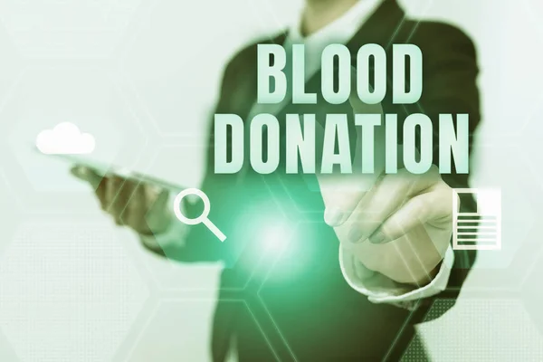 Text showing inspiration Blood Donation. Concept meaning Process of collecting testing and storing whole blood Woman In Uniform Carrying Phone And Tapping Futuristic Display. — Stock Photo, Image