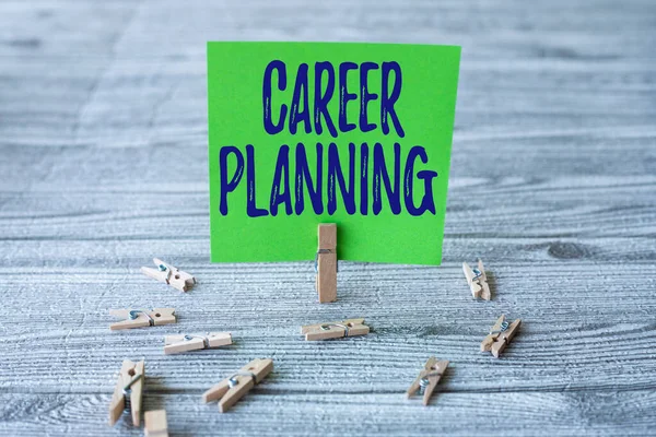 Text showing inspiration Career Planning. Word Written on A list of goals and the actions you can take to achieve them Piece Of Blank Square Note Surrounded By Laundry Clips Showing New Idea. — Stock Photo, Image