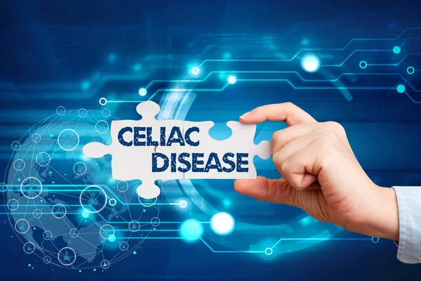 サインを示すインスピレーション｜Celiac Disease.インターネットの概念自己免疫疾患は、主に小腸に影響を与えます手を握りジグソーパズルピースロックを解除新しい未来技術. — ストック写真