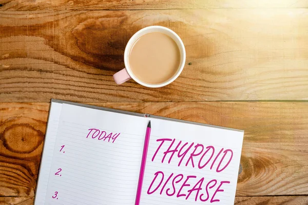 Conceptual caption Thyroid Disease. Concept meaning the thyroid gland fails to produce enough hormones Display of Different Color Sticker Notes Arranged On flatlay Lay Background