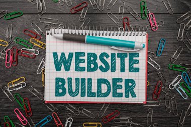 Web sitesi inşaatçısı işareti gösteren bir ilham kaynağı. Kavram, elle kodlanmamış web sitelerinin kurulması anlamına gelir Parlak Yeni Fikirler Yeni Ofis Tasarım Sorunları ve Çözümler
