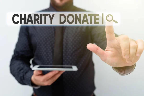Bildunterschrift: Charity Donate. Wort, das auf einem Geschenk einer Einzelperson an eine gemeinnützige Organisation geschrieben wurde, die neue technologische Ideen zur Diskussion technologischer Verbesserungen vorstellt — Stockfoto