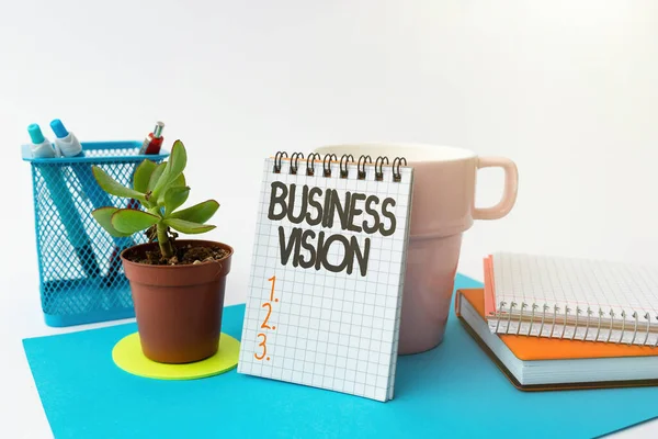 Schild mit der Aufschrift "Business Vision". Geschäftskonzept Wachstum Ihres Unternehmens in der Zukunft basierend auf Ihren Zielen Tidy Workspace Setup Schreibtisch-Tools und Ausrüstung Notizen — Stockfoto