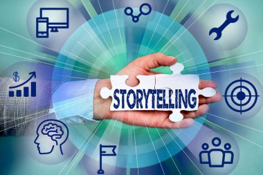 İlham, hikaye anlatma işaretini gösteriyor. Kavramsal fotoğraf etkinliği, bunları kamuya açık El Tutma Yapboz Parçası Yeni Gelecek Teknolojileri Kilidini Açan Yapboz 'a yayınlamak için hikayeler yazıyor..