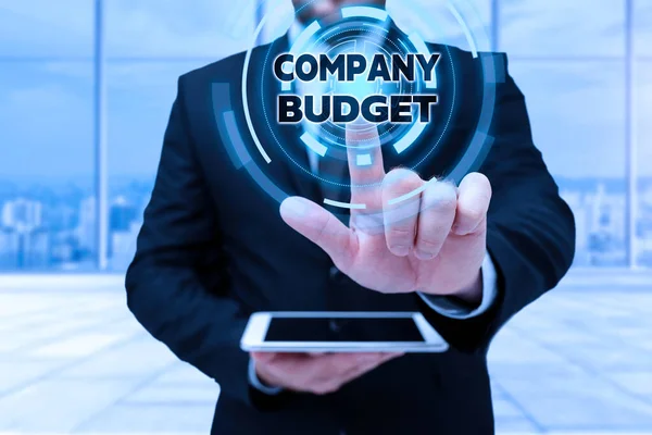 Sign displaying Company Budget. Business approach the financial plan for a defined period often one year Man In Uniform Standing Holding Tablet Typing Futuristic Technologies. — Stock Photo, Image