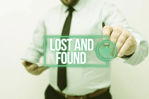 Hand writing sign Lost And Found. Concept meaning a place where lost items are stored until they reclaimed Presenting New Technology Ideas Discussing Technological Improvement — Stock Photo, Image