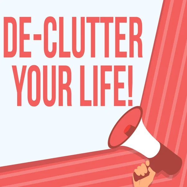 Konceptuální titulek De Clutter Your Life. Slovo napsané na odstranění zbytečných položek z neuklizených nebo přeplněných míst Ilustrace držení ruky Megaphone dělat nádherné oznámení. — Stock fotografie