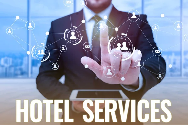 Sign displaying Hotel Services. Internet Concept Facilities Amenities of an accommodation and lodging house Man In Uniform Standing Holding Tablet Typing Futuristic Technologies. — Stock Photo, Image