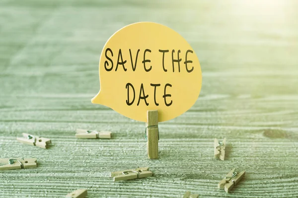 Sign displaying Save The Date. Word for remember not schedule anything else on this day Piece Of Blank Speech Bubble Surrounded By Laundry Clips Showing New Idea. — Stock Photo, Image