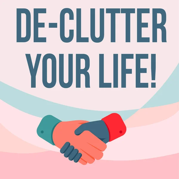 Text s nápisem De Clutter Your Life. Slovo napsané na odstranění zbytečných položek z neuklizených nebo přeplněných míst Kreslení rukou v pozici podání ruky Zobrazeno Pozdravy. — Stock fotografie