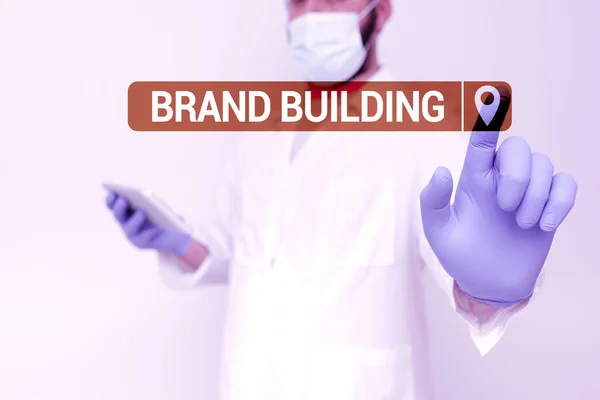 Texte manuscrit Brand Building. Concept d'entreprise Sensibiliser Établir et promouvoir l'entreprise Médecin Expliquer les termes médicaux, Scientifique Enseigner la sécurité en laboratoire — Photo