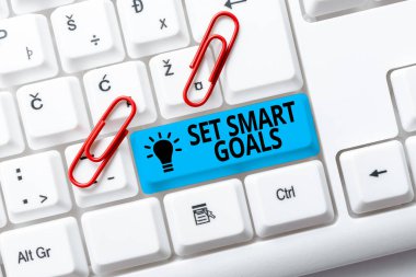 El yazısı işareti Akıllı Hedefler Belirle. İş konsepti, yararlı Blog Öğretim ve Rehberleri Yazma, Çevrimiçi Stratejileri Araştırma Amaçlarının belirlenmesinde rehberlik edecek kriterler sunar