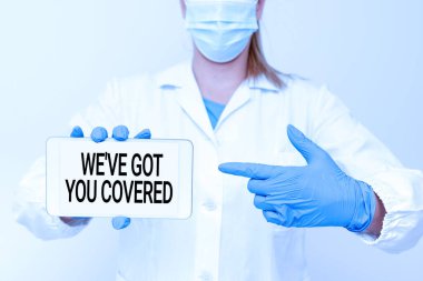 Başlık, seni koruduğumuzu belirtiyor. Kavramsal fotoğraf, Yeni Bilimsel Keşif sunan Tıbbi Teknolojinin ne gerekiyorsa elde etti ya da sağladı.