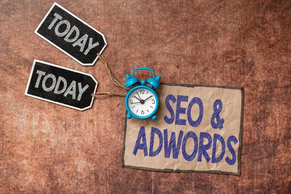 Υπογραφή εμφάνισης Seo And Adwords. Word for they are main tools components of Search Engine Marketing Time Management Plans for Progressing Bright Smart Ideas at Work — Φωτογραφία Αρχείου